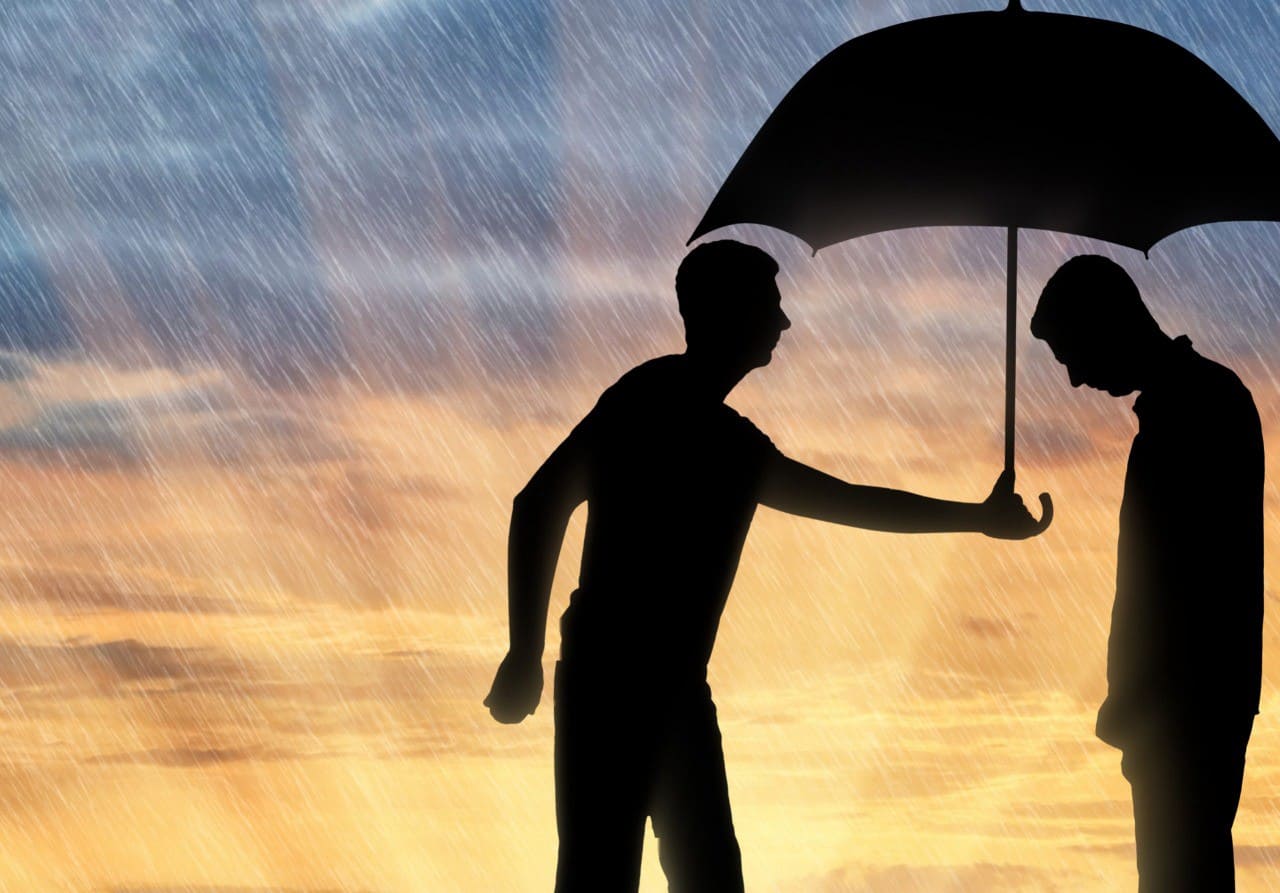 man holding umbrella